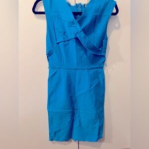 Stretchy aqua blue dress. No dress brand since I purchased it from a thrift shop